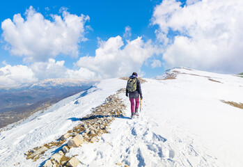 Fototapeta na wymiar Monte Ocre e Cagno (Campo Felice, Italy) - The suggestive mountain peak in Abruzzo region, Ocre and Cagno summit mount range, during the winter with snow