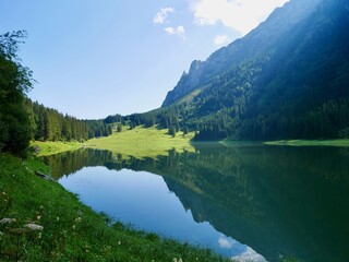 Fototapeta na wymiar Idyllic mountain lake Voralpsee in the Swiss Alps. St. Gallen, Switzerland.