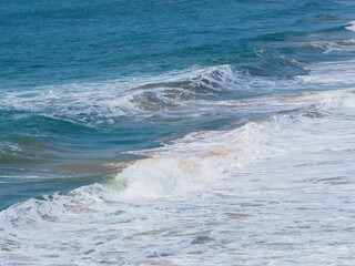 Beautiful foamy sea waves in bad weather.A storm at sea.