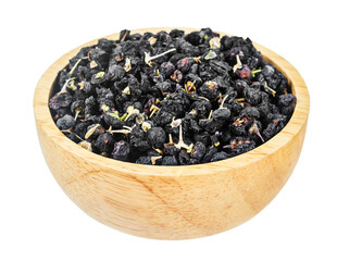 Dried Black wolfberries or black goji berries in wooden bowl isolated on white background.