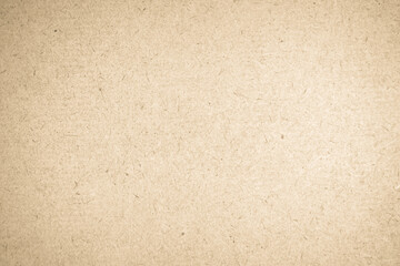 Brown recycled craft paper texture background. Cream cardboard texture vintage.