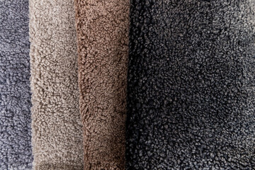 Leather fabrics obtained from natural animals, not yet processed. colored leather pieces hanging