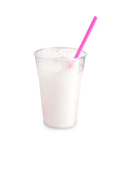 Sicilian granita with Sorrento lemon with straw and transparent glass on a white background