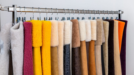 Leather fabrics obtained from natural animals, not yet processed. colored leather pieces hanging