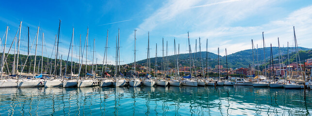 Port of the small Lerici town with many sailing boats moored, tourist resort on the coast of the Gulf of La Spezia, Mediterranean sea, Liguria, Italy, Southern Europe.