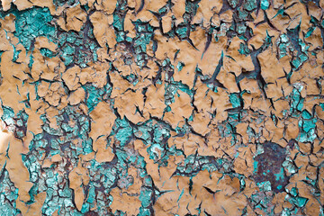 Pattern and texture of old dried paint on rusty metal surface