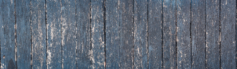 Fototapeta Naturalne Tło starej obdartej z farby ściany z drewnianych desek.
 obraz