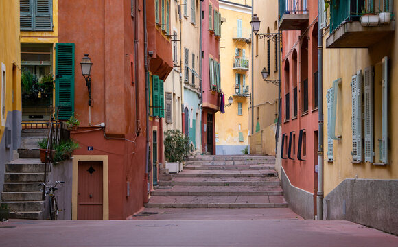The colorful houses of the people of Nice, France, on a very nice and narrow street
