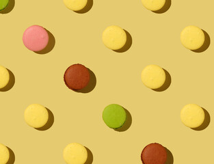 Pattern Macaron cookies on a yellow background