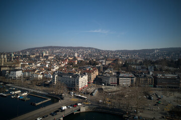 Fototapeta premium Aerial view of City of Zürich with river Limmat, Bellevue Square and lake Zürich on a sunny spring afternoon. Photo taken March 4th, 2022, Zurich, Switzerland.