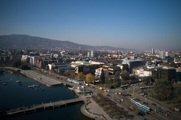Fototapeta premium Aerial view of City of Zürich with lake Zürich, waterfront and Bürkli Square on a sunny spring day. Photo taken March 4th, 2022, Zurich, Switzerland.