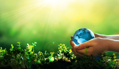 Earth Day. Environment day, save clean planet, ecology concept. Renewable energy-based green...