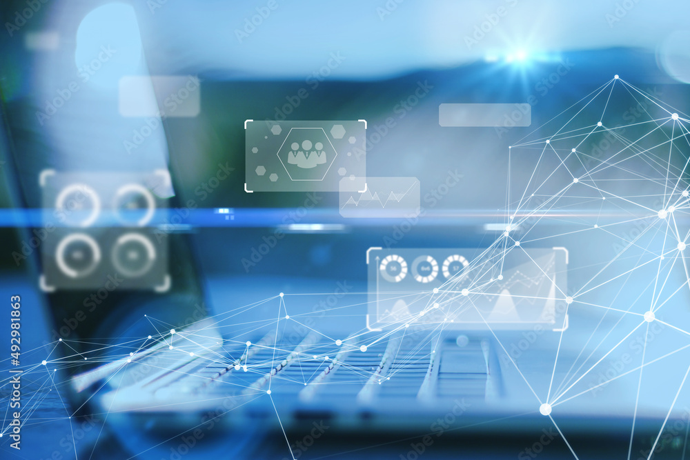Aufkleber close up of laptop with abstract glowing polygonal business chart interface hologram on blurry backg