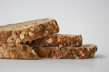 Whole grain bread on white background