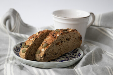 Whole grain bread on white background