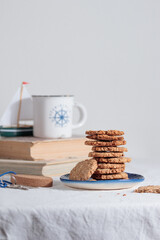 Cup of coffee with cookies in a sailing style