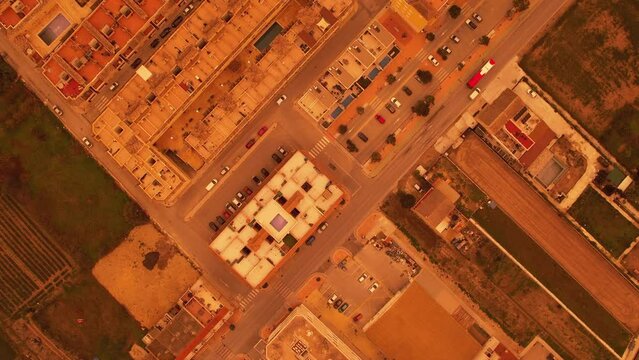 Drone point of view, panoramic scenery spanish town during Calima sandstorm fine dust storm from Sahara desert, daytime view. Province of Alicante, Formentera del Segura. Spain