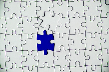 Top view of missing jigsaw puzzle. Conceptual