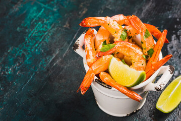 Shrimps cooked shrimps cocktail appetizer on wooden background copy space.	