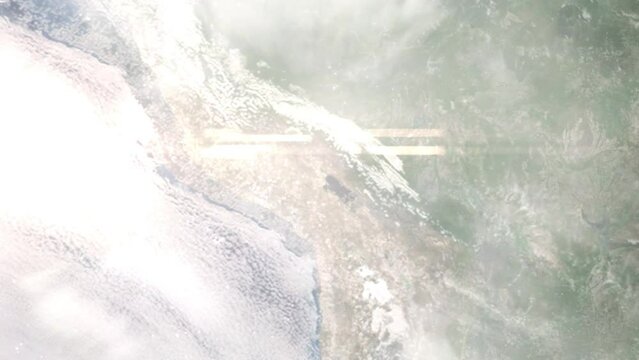 Earth zoom in from outer space to city. Zooming on Juliaca, Peru. The animation continues by zoom out through clouds and atmosphere into space. Images from NASA