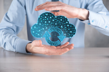 Cloud technology. Polygonal wireframe cloud storage sign with two arrows up and down on dark blue....