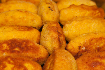 Chicken Kiev fried meatballs close-up.