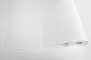 Rolled sheet of white textured wallpaper, on white background. Wallpaper Rolls Mockup