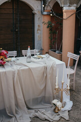 Table setting for an event party or wedding reception. Wedding table decoration rustic style.