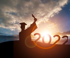 Silhouette Graduation hat and numbers in 2022 years, education congratulation concept ,