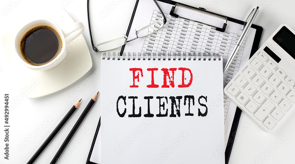 Poster find clients text on the paper with calculator, notepad, coffee ,pen with graph