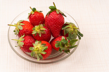 Fresh and Juicy beautiful organic strawberries on wooden background.Top view point.