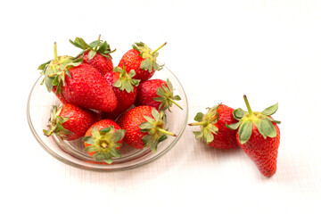 Fresh and Juicy beautiful organic strawberries on wooden background.Top view point.