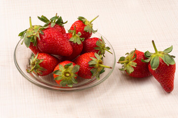 Fresh and Juicy beautiful organic strawberries on wooden background.Top view point.