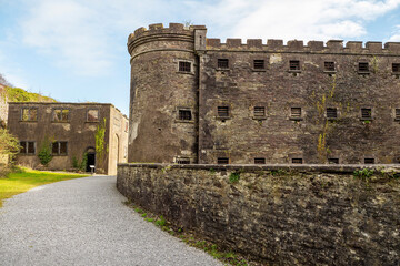 Old stone prison. Brown color jail. History building. Cork Gaol, Ireland. Popular tourist place.
