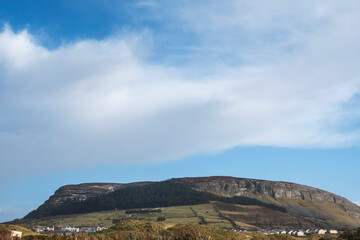 Knocknarea hill and Strandhill town in county Sligo, Warm sunny day, Nobody, Blue cloudy sky....