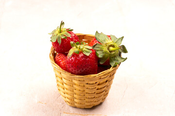 Fresh and Juicy beautiful organic strawberries on wooden background.Top view point.