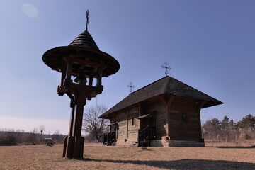 Traditional belfry and prayer house in an old wooden church near Chisinau