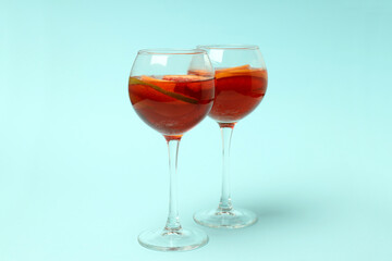 Concept of drink with Sangria on blue background