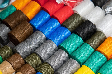 Multi colored bright floss threads-sale in the shop of goods for needlework