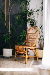 Wicker eco chair in a home garden in sunny day.