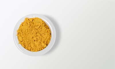 Organic Curcuma Powder on laboratory table.