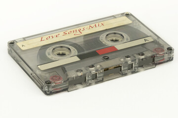 Love songs Mix, vintage audio cassette, white background