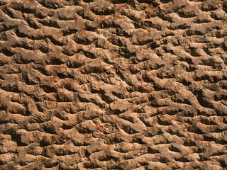 texture of a hard and weathered granite stone