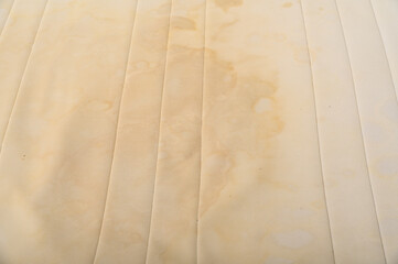 Dirty Old Bed Mattress With Yellow Stains