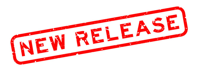 Grunge red new release word rubber seal stamp on white background