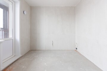 interior of the apartment without decoration in gray colors