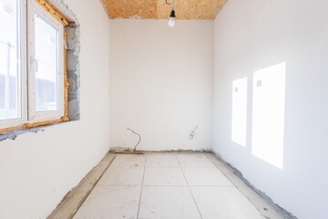 interior of the apartment without decoration in gray colors