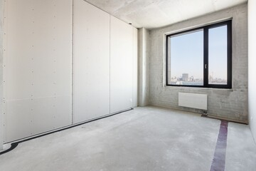 interior of the apartment without decoration in gray colors