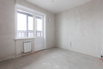 interior of the apartment without decoration in gray colors