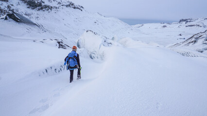 Fototapeta na wymiar Mountain guide at a glacier